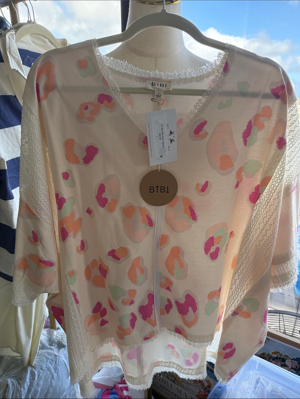 BiBi Cream Floral Spot V-Neck Blouse with Pastel Accents
